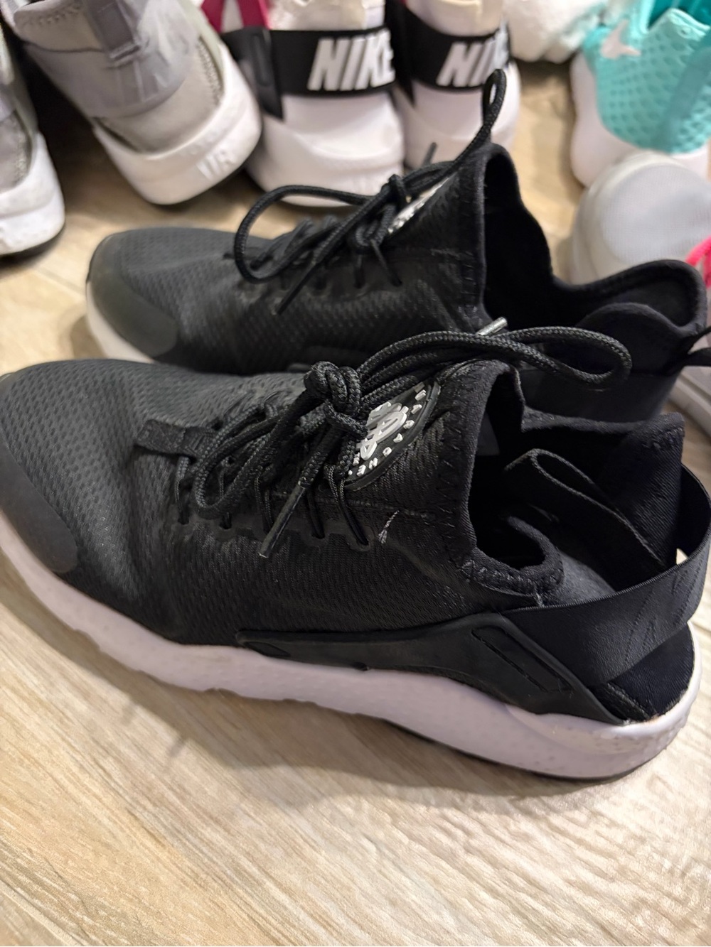 Nike Women’s Black and White Athletic Slip-On Sneakers